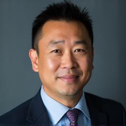 Professional headshot of David Chen.